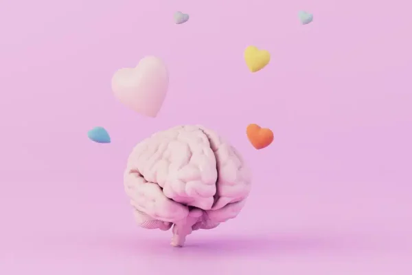 un cerveau avec des coeurs autour